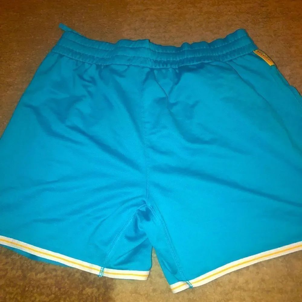 Nike light blue shorts livestrong